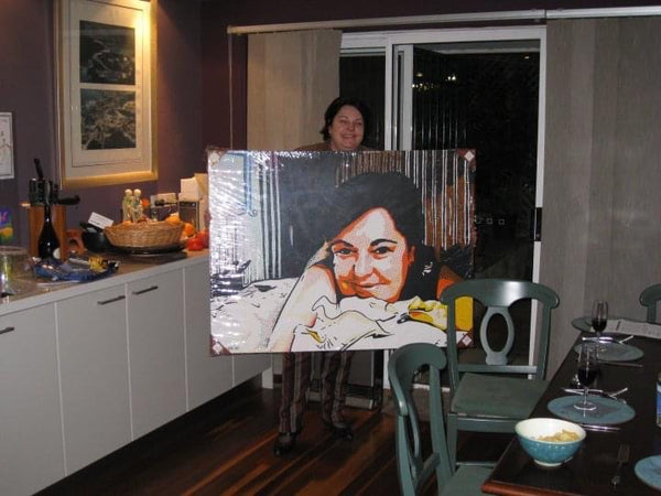 Photo of the model with her painted artwork